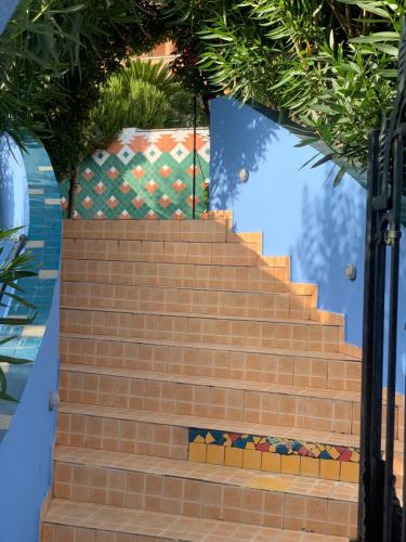 a set of stairs leading up to a building at Maroccana in Dobra Voda