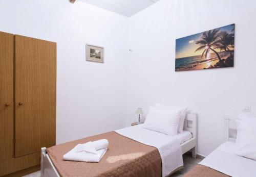 Posteľ alebo postele v izbe v ubytovaní Apartment Panagiotis