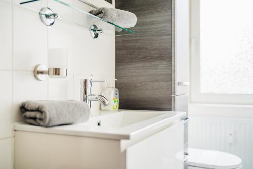 O baie la Tiny Appartment