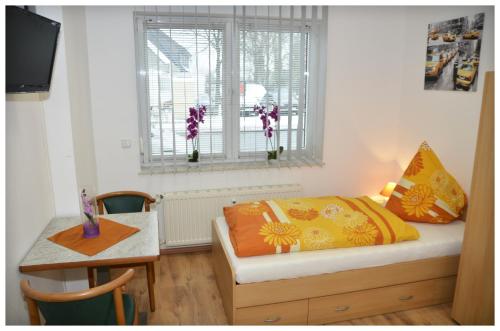 Ліжко або ліжка в номері Gästehaus Buonanotte