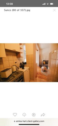 Kuchyň nebo kuchyňský kout v ubytování Apartman sunce Visoko
