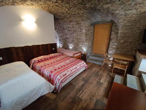 Postel nebo postele na pokoji v ubytování B&B La Presef