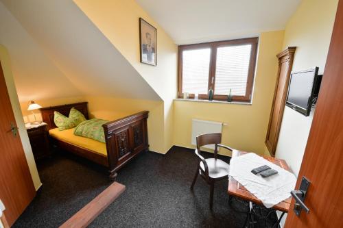 Postel nebo postele na pokoji v ubytování Hotel s restaurací Splávek