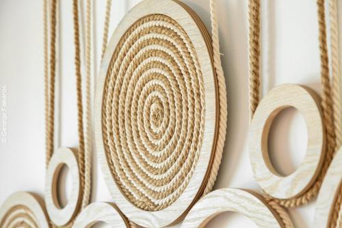 a close up of a wooden number with ropes at Dimitra's Paradise Villa in Lygia