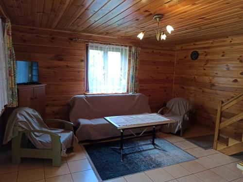 Photo de la galerie de l'établissement Domek centrum jezioro Białe Okuninka, à Okuninka