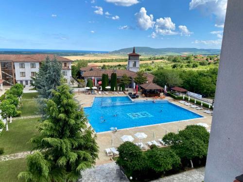 an overhead view of a hotel with a swimming pool at Apartment C51 in Rogachevo