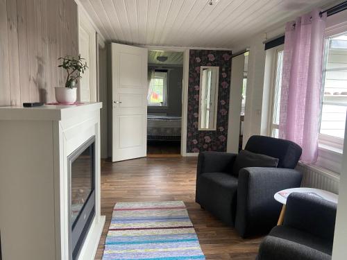 Posezení v ubytování Mysigt hus i Torsby