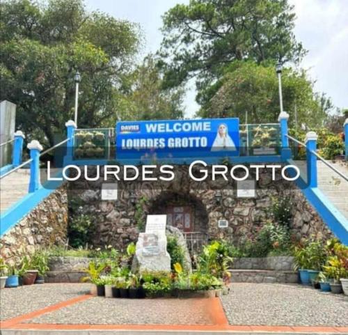 a welcome sign at the entrance to lourdes cortico at Baguio Dreamz - Transient in Baguio