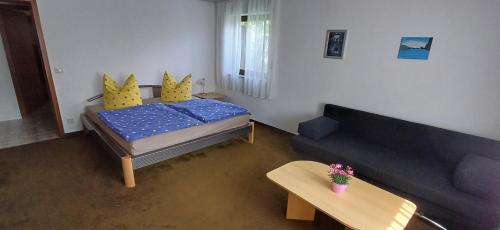 Ένα ή περισσότερα κρεβάτια σε δωμάτιο στο Ferienwohnung Roth
