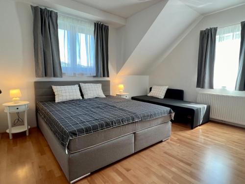 Postel nebo postele na pokoji v ubytování Apartment Šentjur center