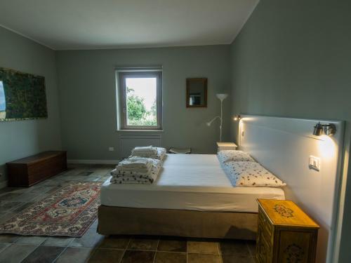 Postel nebo postele na pokoji v ubytování B&B Podere684