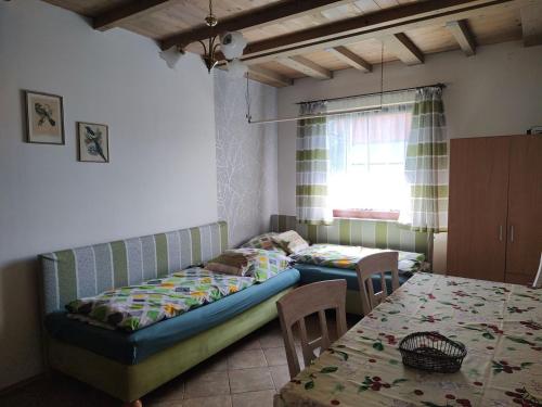 Postel nebo postele na pokoji v ubytování Apartmány Brevant