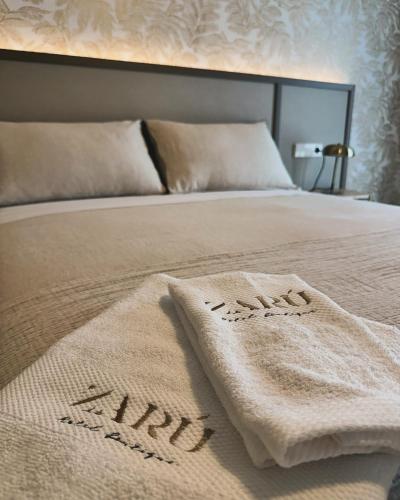 Katil atau katil-katil dalam bilik di Zarú Hotel Boutique