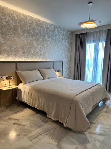 Katil atau katil-katil dalam bilik di Zarú Hotel Boutique