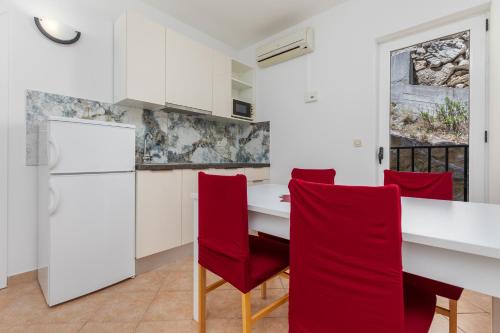 Kuchyň nebo kuchyňský kout v ubytování Sita Apartmani