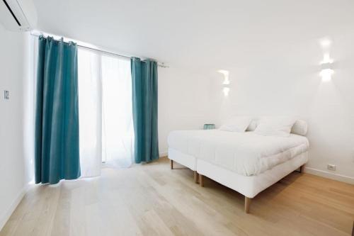 Ένα ή περισσότερα κρεβάτια σε δωμάτιο στο K-Sea Villa Boutique De Luxe à Cassis