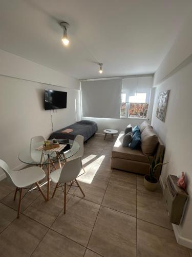 TV a/nebo společenská místnost v ubytování Apartamento en el Corazón de Mendoza