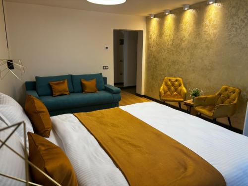 Postel nebo postele na pokoji v ubytování Pensiunea Anton Pann