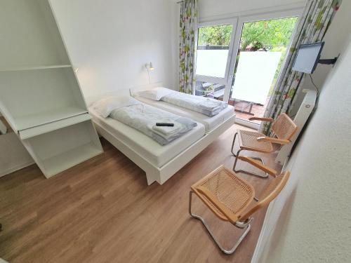 Ένα ή περισσότερα κρεβάτια σε δωμάτιο στο Aparthotel Jonas
