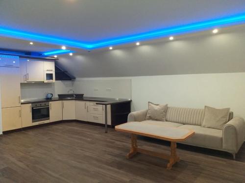 a living room with a couch and a table at Ivan in Livno