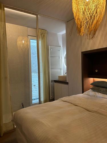 Katil atau katil-katil dalam bilik di Le Belvédère Beachview