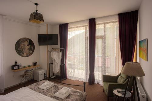Μια τηλεόραση ή/και κέντρο ψυχαγωγίας στο Mood Hotel Kazbegi