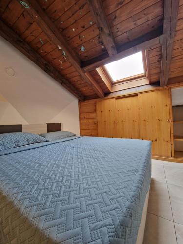 Postel nebo postele na pokoji v ubytování Maisons de Aoste