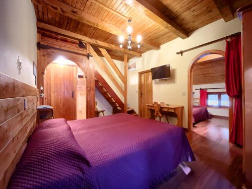 Postel nebo postele na pokoji v ubytování Hotel Garnì Mille Pini