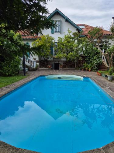 Apartment 55 m2, sunny garden & pool in Villa 1905