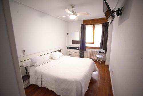 Postel nebo postele na pokoji v ubytování Apartacentro