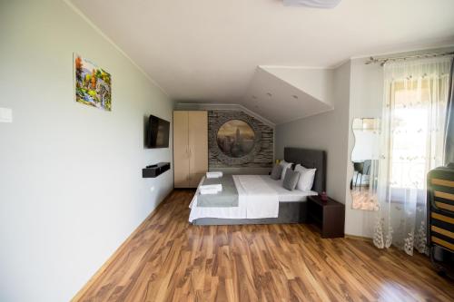 MintiaにあるCasa Royalの部屋にベッドがある寝室