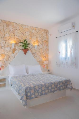 Starlight Luxury Seaside Villa & Suitesにあるベッド