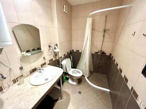 Ένα μπάνιο στο Vadim Apartments in Panorama Beach Vigo Nessebar