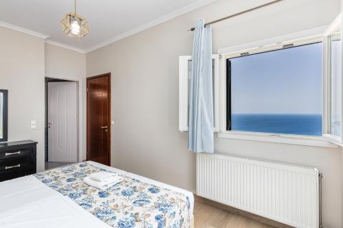 Katil atau katil-katil dalam bilik di Villa Vardia-Amazing Seaviews with heated pool