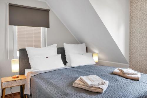 Postel nebo postele na pokoji v ubytování Haus Seerose - Ferienhaus mit Garten nahe Fleesensee für Natur und Erholung