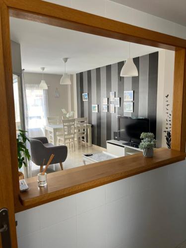 a view of a living room and dining room at Fantástico apartamento playa in Cala de Finestrat