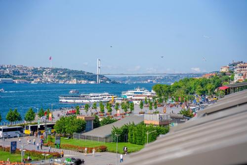 a view of a harbor with boats in the water at The Palm Bosphorus Hotel in Istanbul