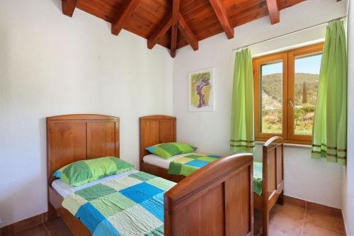 Postel nebo postele na pokoji v ubytování House Irena