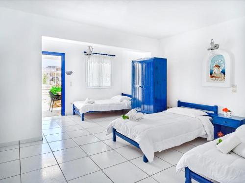 Ένα ή περισσότερα κρεβάτια σε δωμάτιο στο Fyrogenis palace