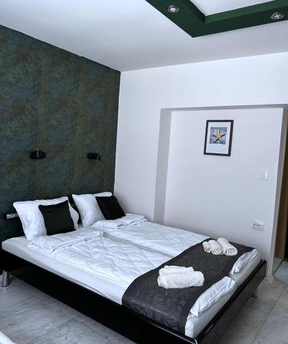 Ένα ή περισσότερα κρεβάτια σε δωμάτιο στο Villa Elena