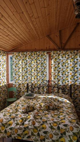 Postel nebo postele na pokoji v ubytování cottage Merisi inn
