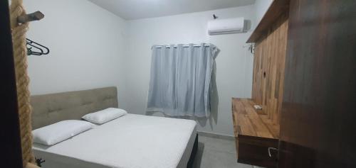 Postel nebo postele na pokoji v ubytování Casa Praia -Proximo das principais praias- São Francisco do Sul