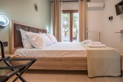 Ένα ή περισσότερα κρεβάτια σε δωμάτιο στο latus apartments