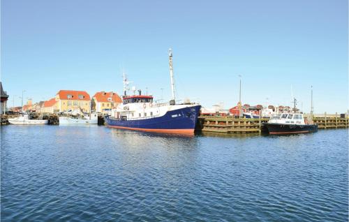 a group of boats are docked in a harbor at Holiday Home Skovstjernevej Lemvig Ii in Lemvig