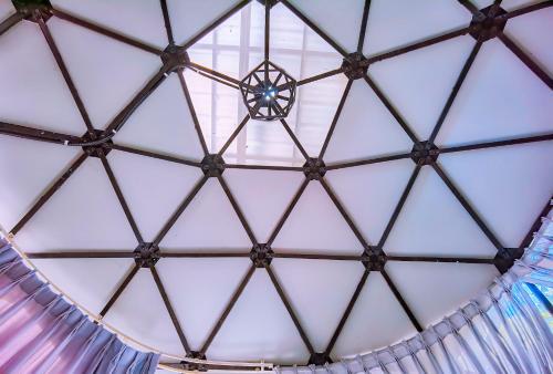 a view of the ceiling of a building at Adventure Dome Resort in Kep