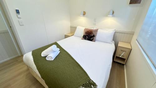 Postel nebo postele na pokoji v ubytování BIG4 Tasman Holiday Parks - Bright