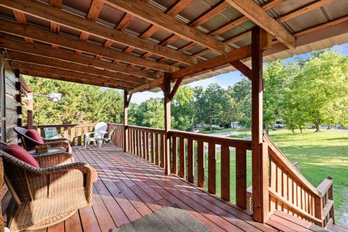a wooden deck with a pergola on a house at Hillbilly Highrise in Sevierville