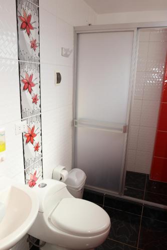 Ein Badezimmer in der Unterkunft INTI SUMAQ WASI