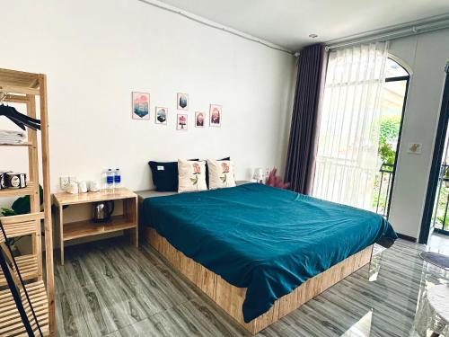 Postel nebo postele na pokoji v ubytování Bin House - Mộc Châu