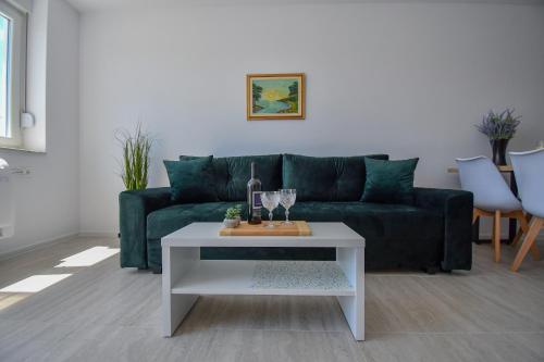 Ruang duduk di Apartman Luca